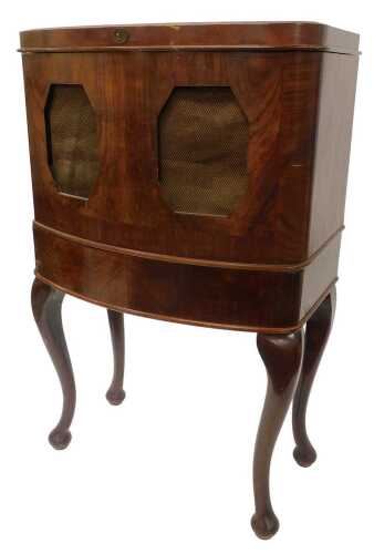 A 1930s Art Deco McMichael radio receiver, in walnut freestanding cabinet, with hinged...