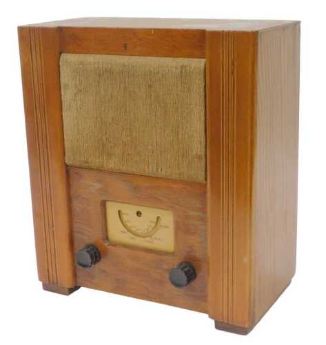 A mid 20thC walnut cased Civilian utility radio, probably mid 1940s, in walnut case, 39cm high....