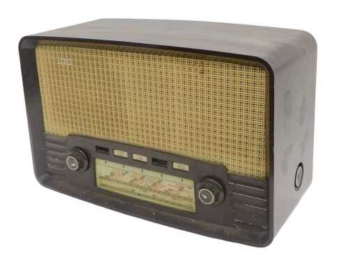 A mid 20thC Ekco model U199 Bakelite cased radio, 30cm high. WARNING! This lot contains untested...