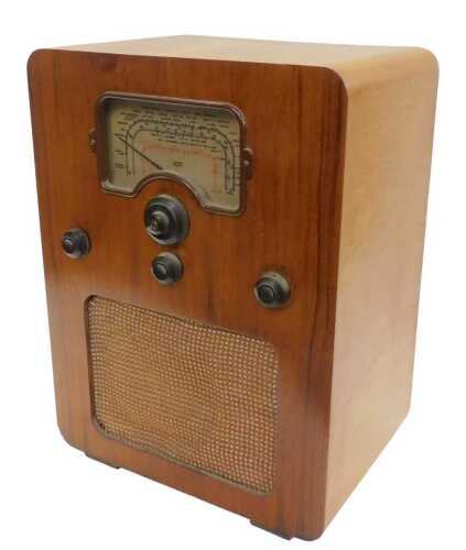 A mid 20thC walnut cased Cossor Melody Maker valve radio, circa 1940, 49cm high. WARNING! This...