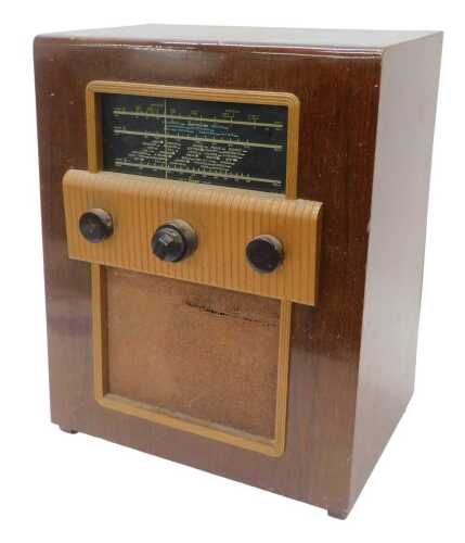A mid-20thC walnut cased Cossor radio, probably a 71, circa 1938, 51cm high. WARNING! This lot...