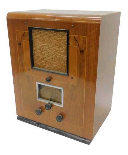 A mid-20thC walnut cased Alba R&A Wolverhampton Art Deco speaker, with Bakelite knops, 50cm high....
