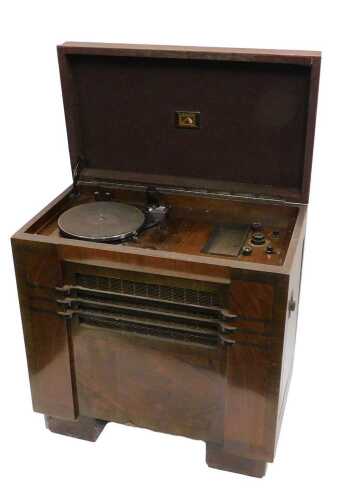 A mid 20thC walnut cased freestanding HMV gramophone record player, with baize turntable,...