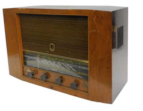 A mid 20thC walnut cased McMichael model 855 vintage radio, circa 1955, 41cm high. WARNING! This...