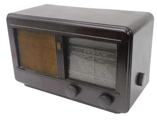A mid-20thC Bakelite cased Philips radio, 10343, 60 watts, 26cm high.