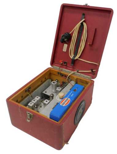 A mid 20thC Roberts R66 valve radio, circa 1956, in red case, 27cm wide. WARNING! This lot...