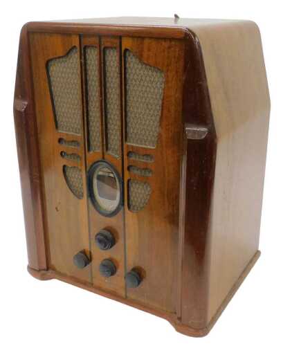 A mid 20thC walnut case Philco tombstone style radio, circa 1930s, 52cm high. WARNING! This lot...