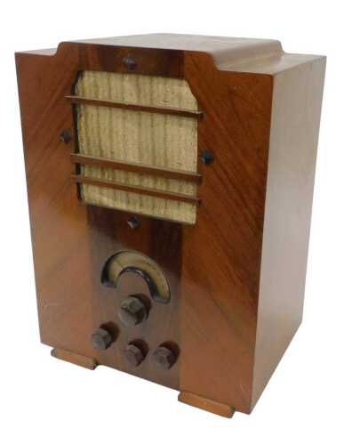 A mid 20thC walnut cased Zenith model 808 tombstone radio, circa 1935, 47cm high. WARNING! This...