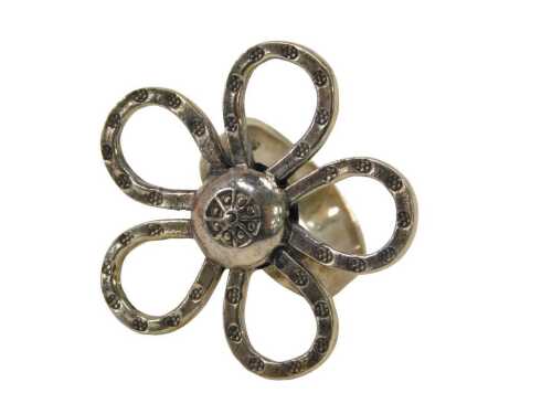 A flower dress ring, the elaborate five petal flower, 3cm wide, on a plain band stamped 925,...