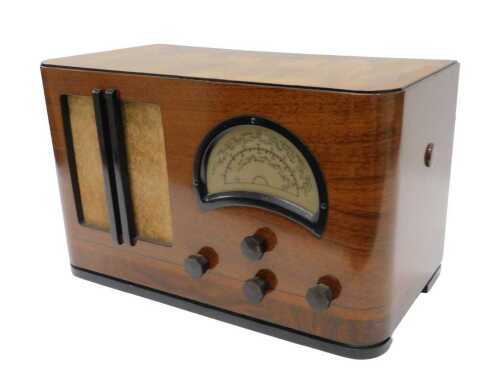 A mid 20thC walnut cased HMV brand 360 radio, 26cm high. WARNING! This lot contains untested or...