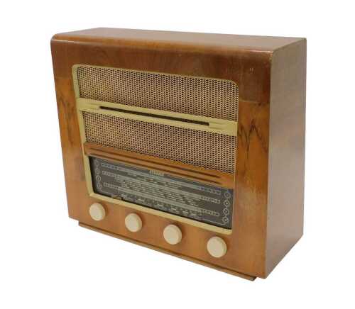 A mid 20thC walnut cased Etronic radio, model number ETA5316, 40cm high. WARNING! This lot...