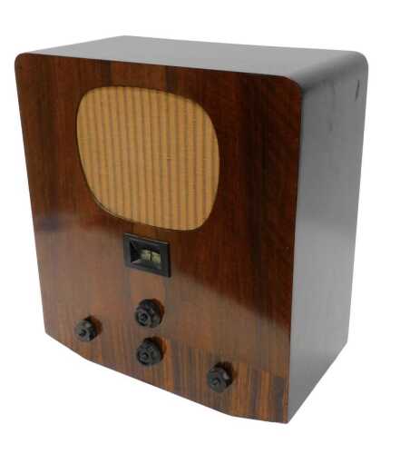 A mid 20thC walnut cased radio, probably a Murphy A30, 47cm high. WARNING! This lot contains...