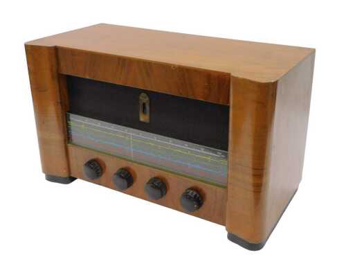 A mid 20thC walnut cased Berec Skyscraper MK II radio, c.1955, 30cm high. WARNING! This lot...