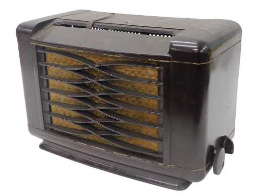 A mid 20thC Bakelite cased Philips Type 462 A15 radio, in a shaped case, 30cm high. WARNING!...
