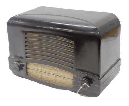 A mid 20thC Bakelite cased Cossor model 462.AC radio, 25cm high. WARNING! This lot contains...
