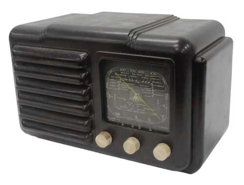 A mid 20thC Bakelite cased Raymond F17 radio, circa 1947, 26cm high. WARNING! This lot contains...