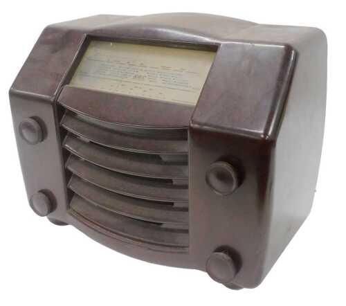 A mid 20thC GEC Bakelite valve radio, probably BC4940, 33cm high. WARNING! This lot contains...