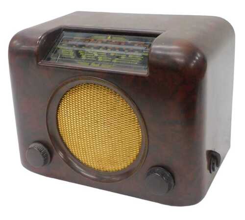 A mid 20thC Bush Bakelite cased type DAC90.A ACDC radio, 21cm high. WARNING! This lot contains...