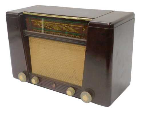 A mid 20thC Bakelite cased Philips 170A radio, circa 1945, 31cm high. WARNING! This lot contains...