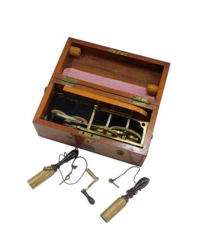An early 20thC mahogany cased Maw style Magneto Electric machine, 27cm wide.