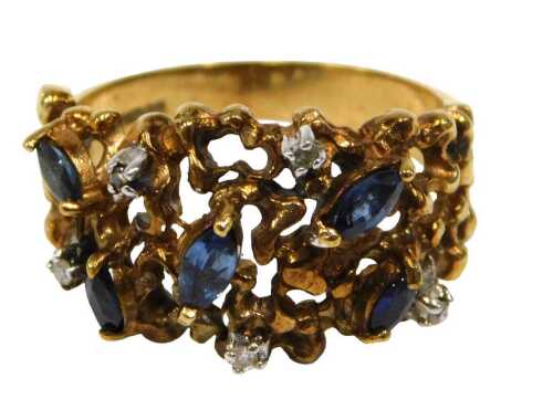 A 9ct gold abstract style dress ring, of waved and brushed design, set with five marquise cut...
