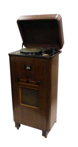 A mid 20thC freestanding Murphy Type 24RG radiogram record player, in walnut cabinet, 103cm high,...
