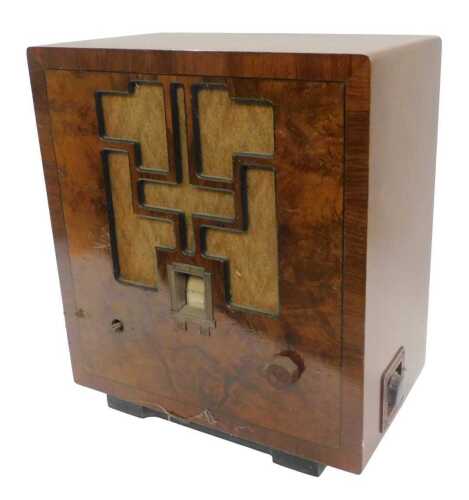 A vintage walnut cased Art Deco design radio, 48cm high. WARNING! This lot contains untested or...
