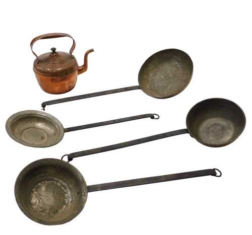 Various copperware, an early 20thC kettle with fixed handle, 24cm high, and four long handled...