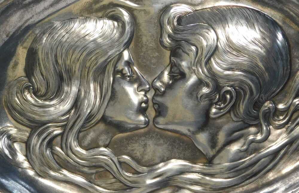 A WMF Art Nouveau metal dish, of oval waved form, decorated in relief ...
