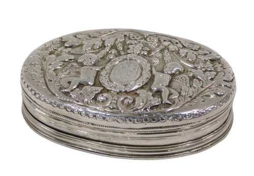 A William III Britannia silver box, of oval form, with removable lid, repousse decorated with...