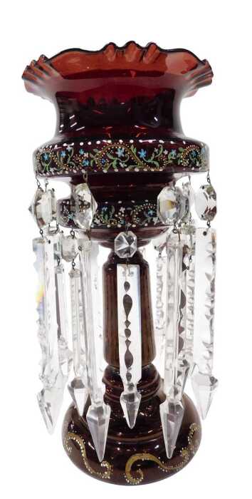 A Victorian ruby glass lustre, with moulded top, cylindrical stem, plain glass droppers,...