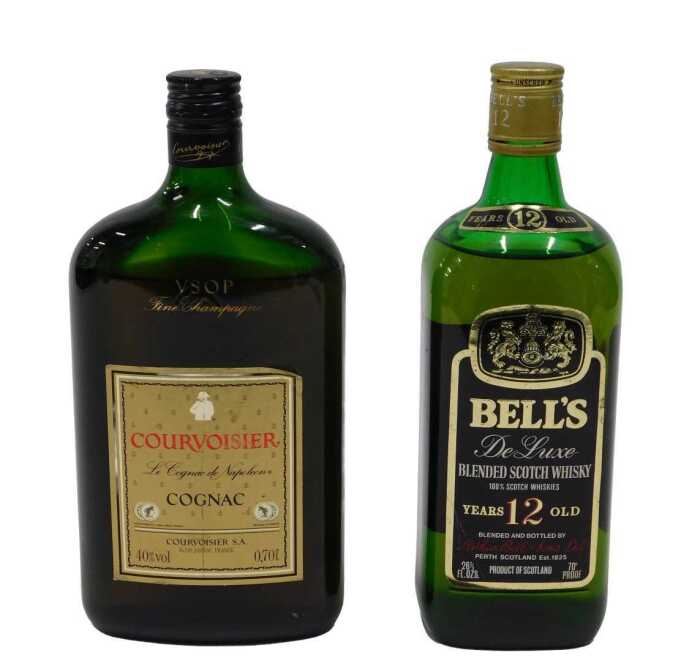 Two bottles of alcohol, to include a Bell's twelve year old blended Scotch whisky and a...