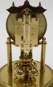 A 20thC Haller anniversary clock, with 8cm diameter dial on turned pillars, in domed case, 20cm... - 3