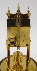 A 20thC brass anniversary clock, the 7cm diameter face in architectural case, on turned pillars,... - 3