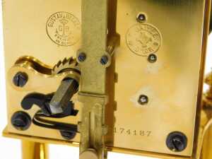 A 20thC brass anniversary clock, the 7cm diameter face in architectural case, on turned pillars,... - 5