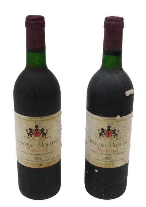 Two bottles of Chateau Moulinet Pomerol 1983 red wine.