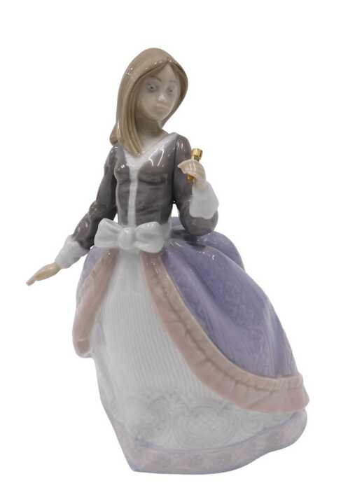 A Lladro figure Angela, girl with pink parasol, 5211, 8cm high (parasol loose), boxed.