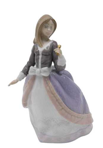 A Lladro figure Angela, girl with pink parasol, 5211, 8cm high (parasol loose), boxed.