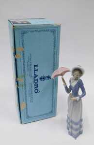 A Lladro figure of a lady with parasol, D6A, 31cm high (parasol loose), boxed. - 3