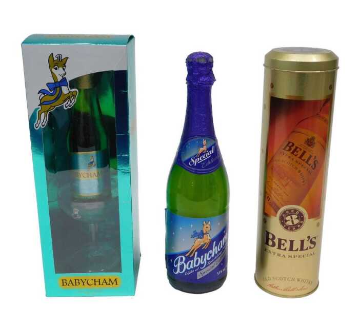 Three bottles of alcohol, to include a Bell's Extra Special eight year old blended Scotch whisky,...