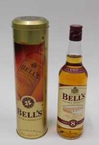 Three bottles of alcohol, to include a Bell's Extra Special eight year old blended Scotch whisky,... - 3