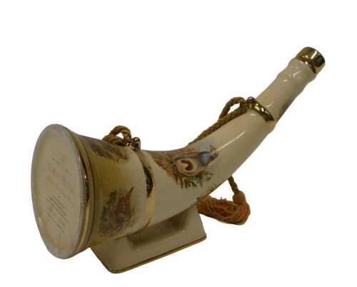 A Robyn Hoode Distilleries single malt whisky horn shaped pottery decanter, transfer printed, on...