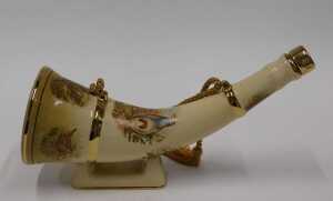 A Robyn Hoode Distilleries single malt whisky horn shaped pottery decanter, transfer printed, on... - 2