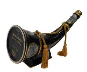 A Robyn Hoode Distilleries single malt whisky horn shaped pottery decanter, transfer printed...