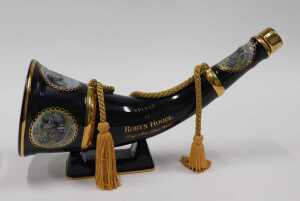 A Robyn Hoode Distilleries single malt whisky horn shaped pottery decanter, transfer printed... - 2