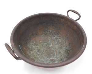 An early 20thC copper bowl, with fixed handles, 42cm wide. - 2
