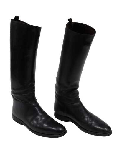 A pair of early 20thC black leather riding boots, numbered 29, 39cm high.