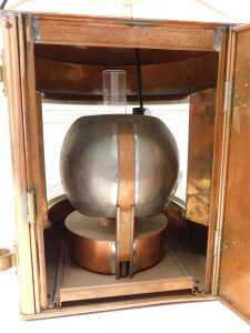 An early 20thC Toplight copper and brass ship's lantern, with glazed front, swing handle, later... - 4