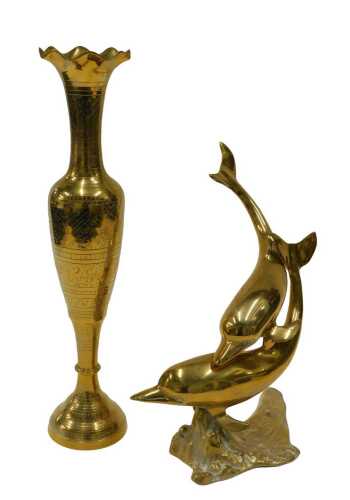 Brassware, a Dolphin group, 35cm high, and an Eastern vase with flared rim and shouldered body. (2)
