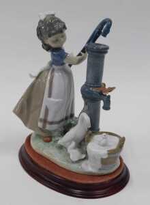 A Lladro figure group Summer on the Farm, number 5285, on stand, 26cm high. - 2